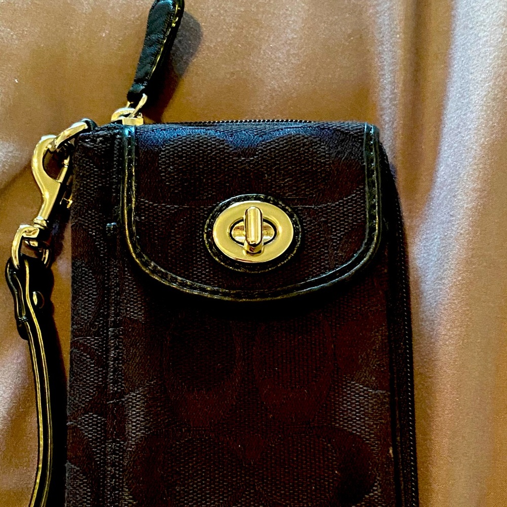 Coach phone case and wallet.